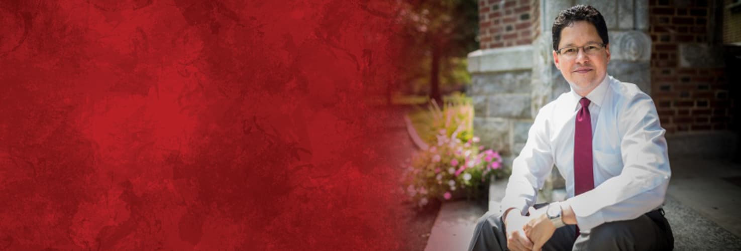 man sitting red tie red border